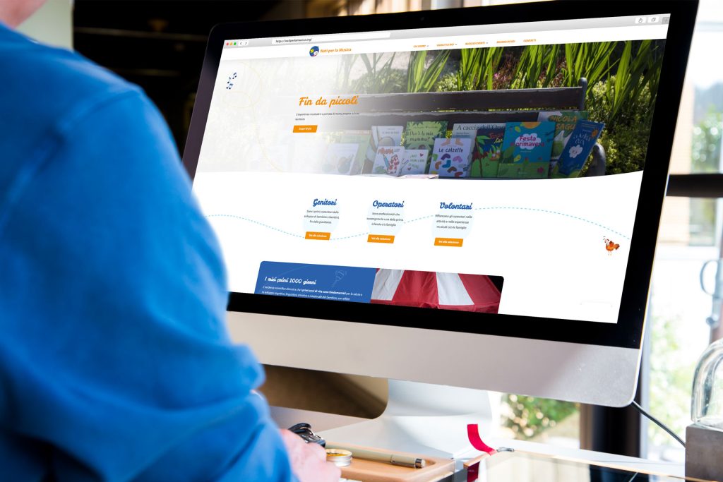 Homepage del sito web Nati per la Musica visualizzato su un computer fisso